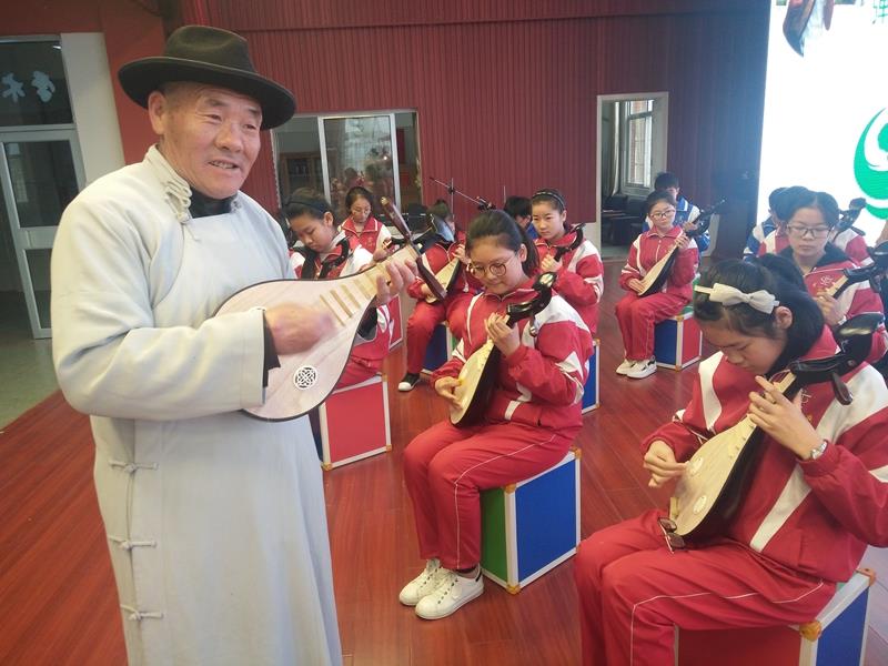 王廣超：傳承湖區(qū)文化  土琵琶進課堂